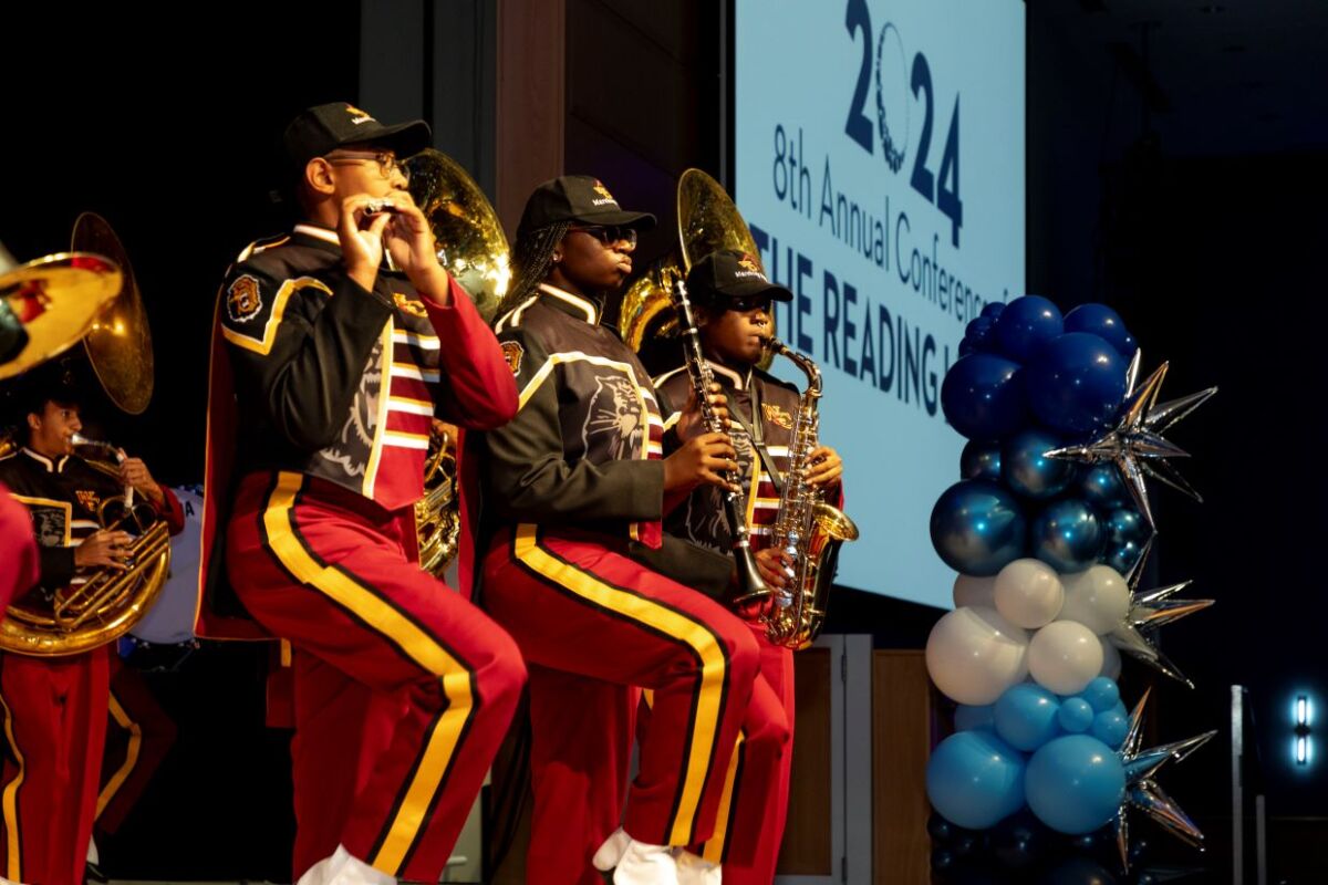 The Reading League Annual Conference marching band performing on stage